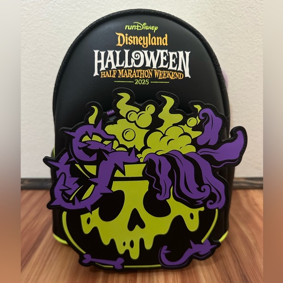 Disney Handbags - NWT Loungefly Disney parks run disney Halloween Backpack